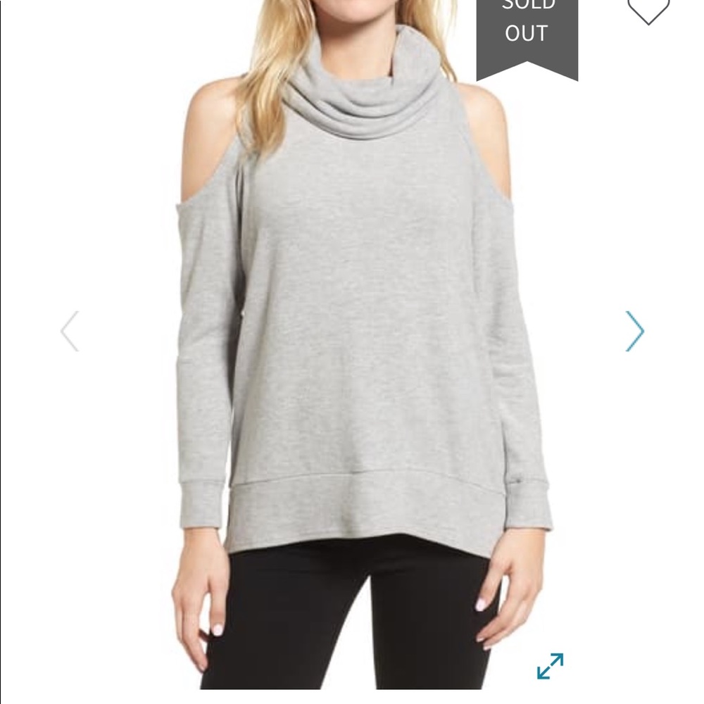 Grey turtleneck sweater with open shoulders
